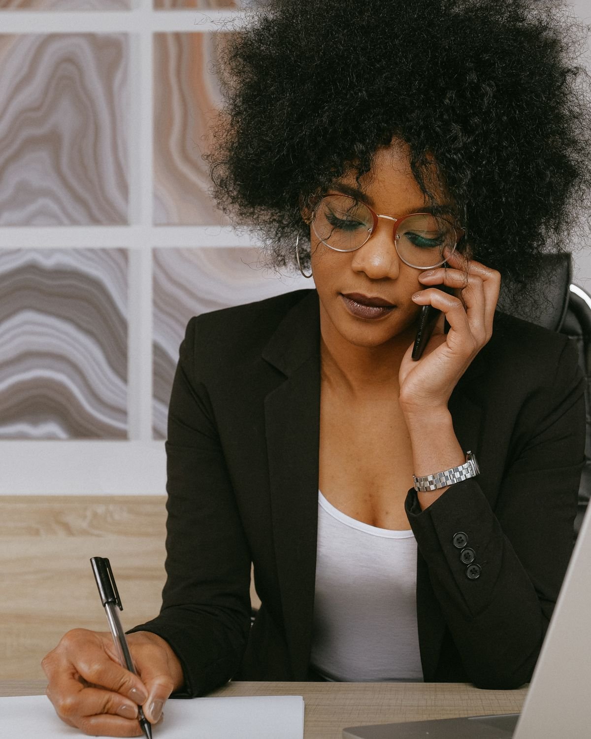 A business owner making a payment on behalf of her company